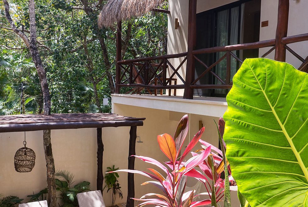 Loft Apartment terrace at Casa Yaakun overlooking the main pool and gardens